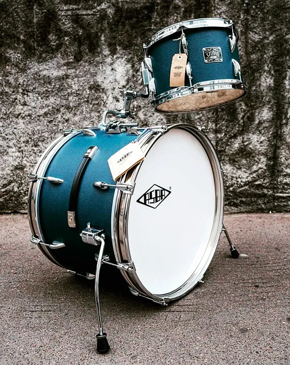 Blue bass drum and rack tom, both with a batter and a resonant head
