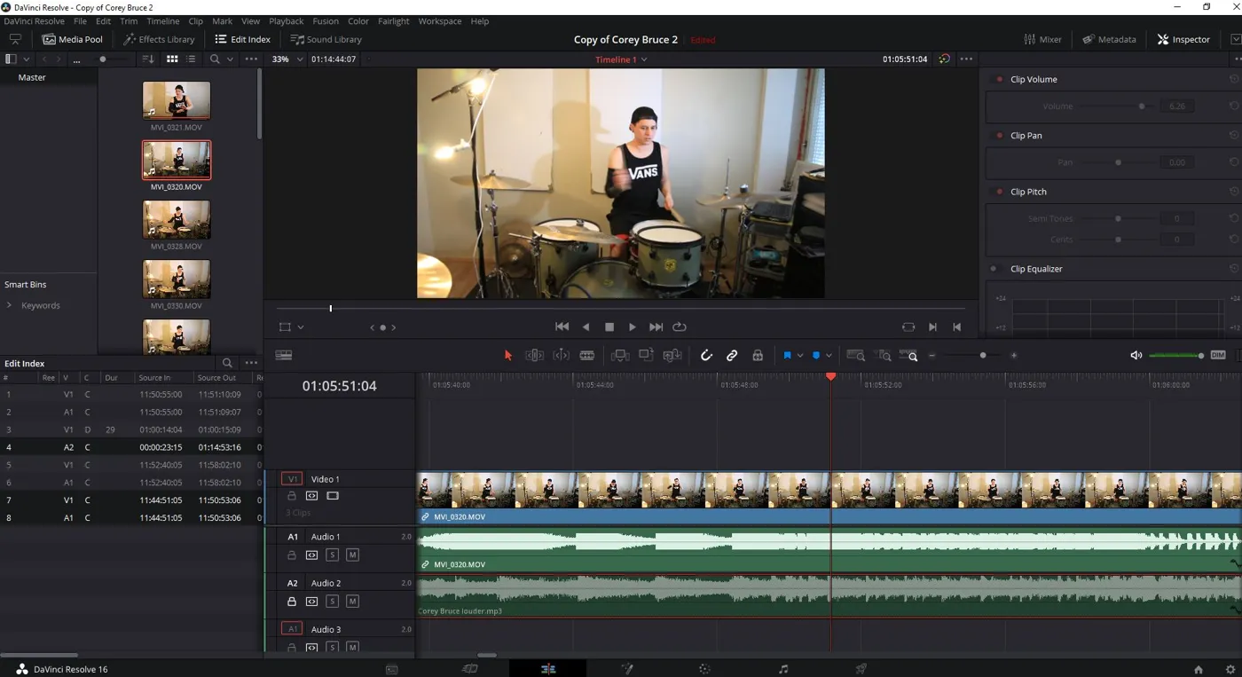 Editing software view: drum video at the top, mic audio track and backing music below