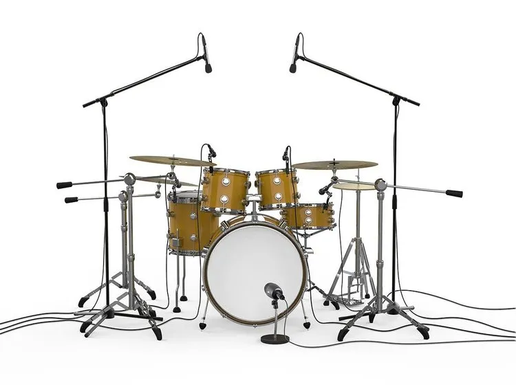 Miked-up acoustic drum kit: two overhead mics and a mic in front of the bass drum