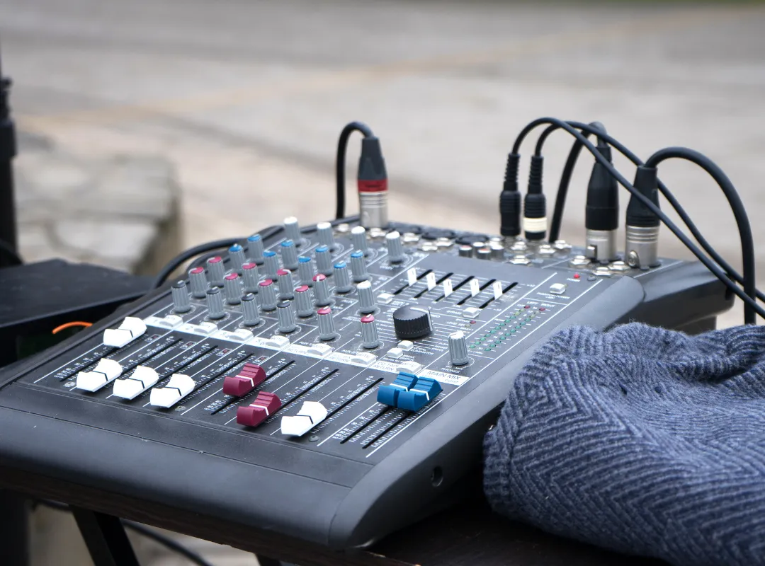 Small analog mixer with XLR cables plugged in