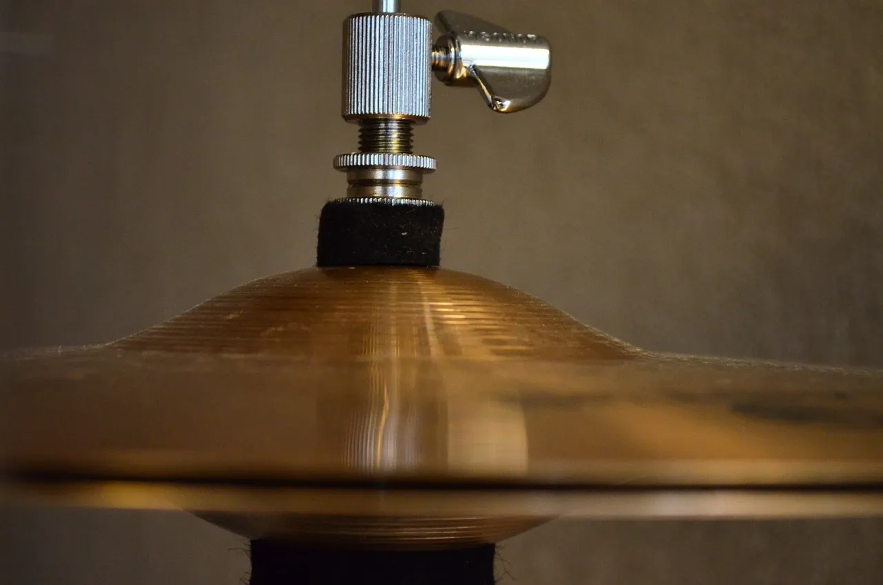 Close-up of the hi-hat cymbals and clutch