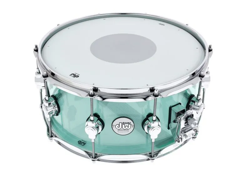 A see-through green acrylic-shell DW snare