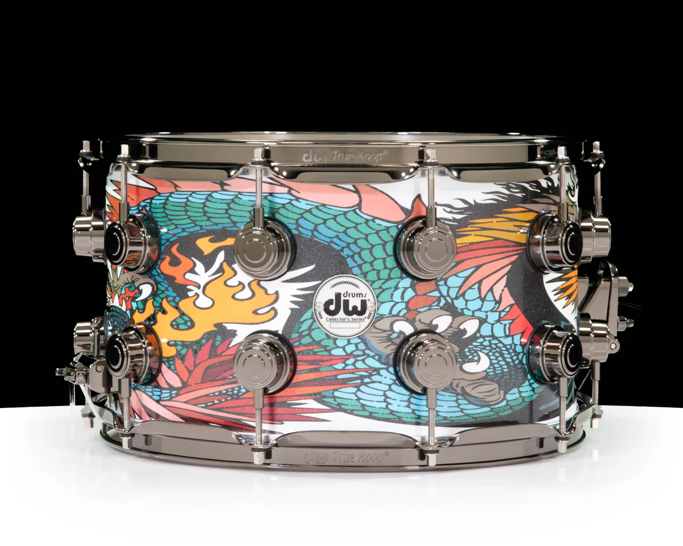 A DW snare with a colorful dragon illustration